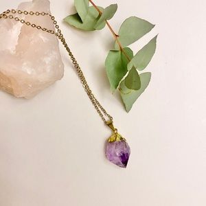 Amethyst necklace on a long gold chain
